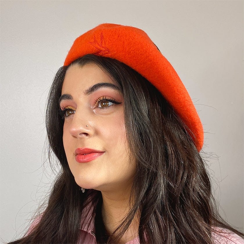 Orange baret med solsikke Accessories Erstwilder