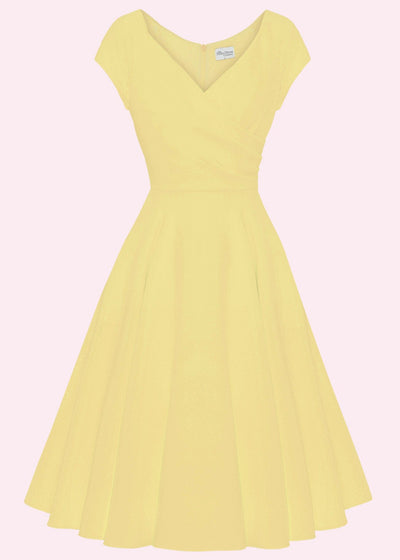 1950'er Hourglass swingkjole i pastel gul tøj Pretty Dress Company 